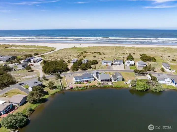 Viewing from above, the magnificent Pacific Ocean is across the street and Seabreeze Lake the backyard.