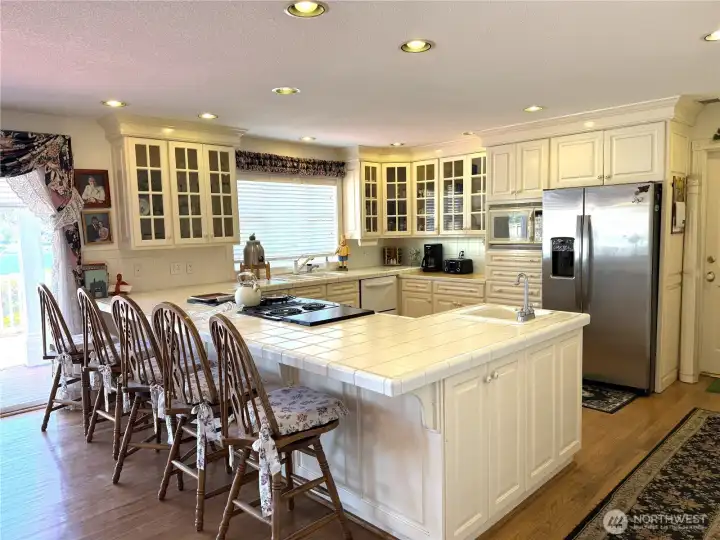 Chef's kitchen with lots of counter space, prep sink and custom cabinets.