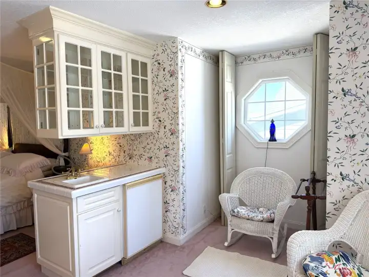 Sink and refrigerator for storing wine, making coffee in the morning and watching the sunrise.