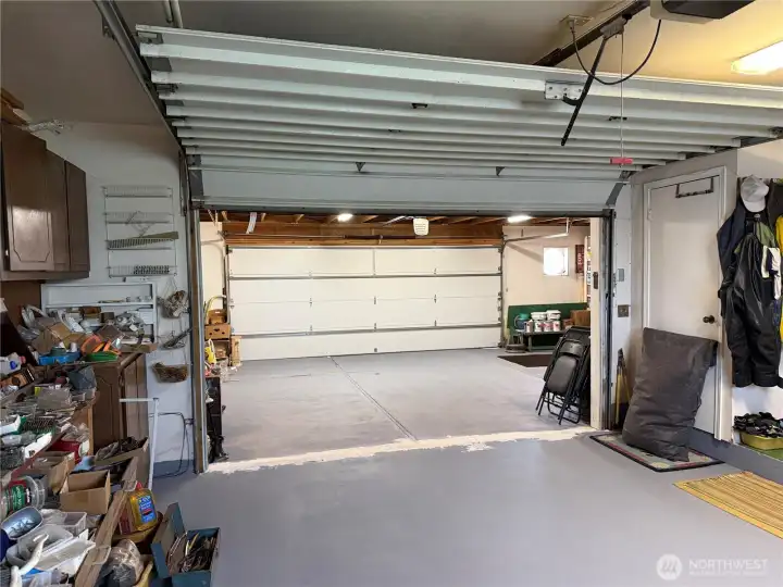 Large shop with 1/2 bath with a two car garage.