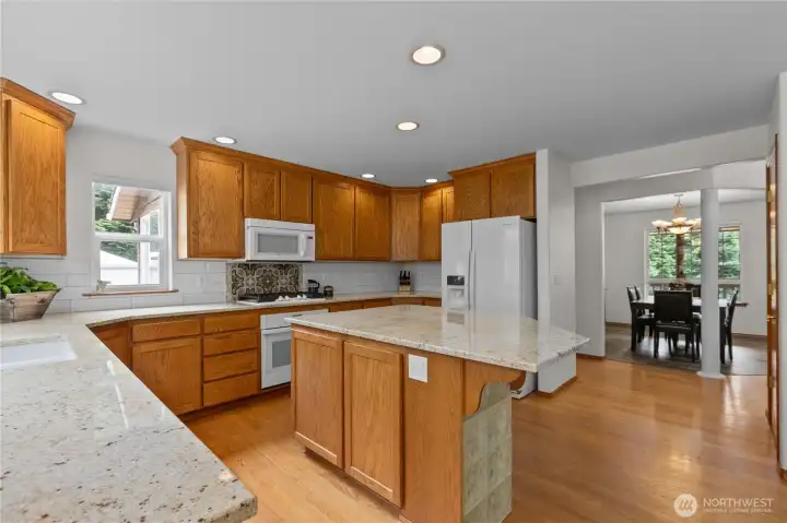 Kitchen with slab counters and a generous island