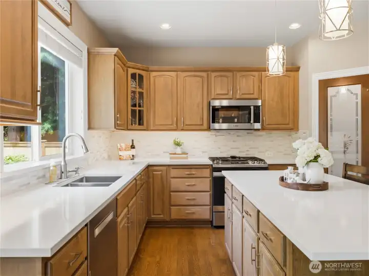 The heart of the home, this spacious kitchen offers extensive prep space, modern finishes, and seamless functionality.