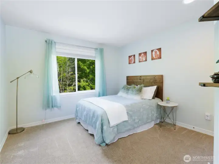 A light and bright bedroom, one of 5 bedrooms upstairs.