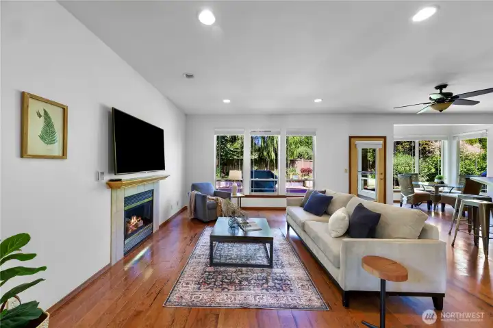 Great room has gas fireplace and conveyable television