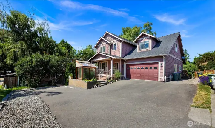 Lots of parking in the attached garage and in the sprawling driveway