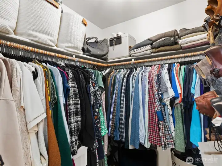 Primary walk in closet. Primary walk in closet.