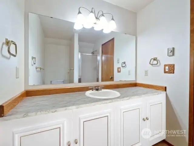 Primary bathroom  virtually staged