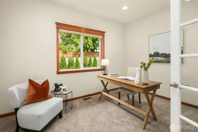 3rd bedroom is off the living room. The French doors allow endless options! Bedroom, office, guest quarters- you choose!