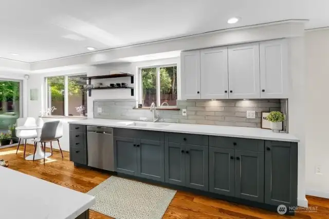 Dog door to backyard sits right behind kitchen breakfast nook table.