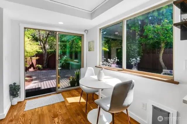 Another easy access to back yard with sliding doors out to brick paver patio!