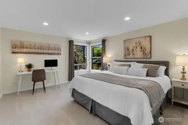 Enormous master suite that was completely remodeled, enjoy peaceful peek-a-boo puget sound view from your bedside here!  What a way to wake up!!!