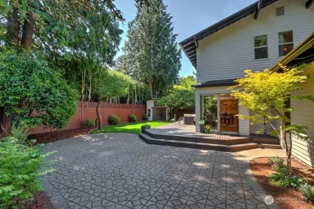 Side patio off kitchen and garage with pavers to make life easy and maintenance a cinch!