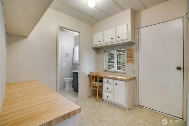 The door on the right steps out to the second covered patio.