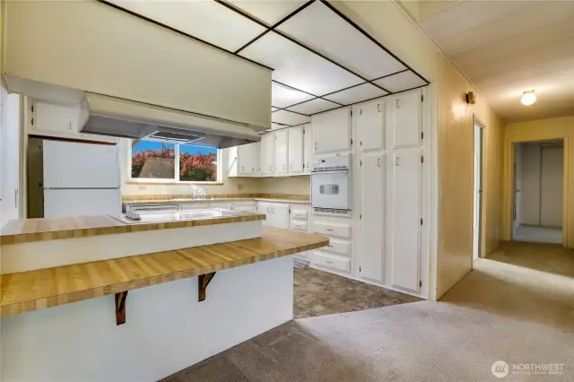 The kitchen is the heart of the home and this eat-in bar makes for easy entertaining.