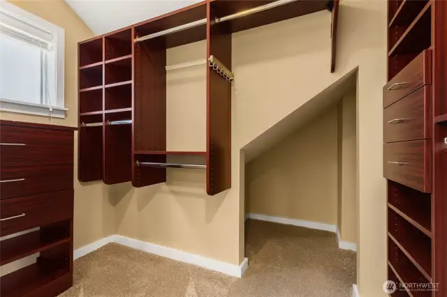 Walk-in closet with custom built-in shelving