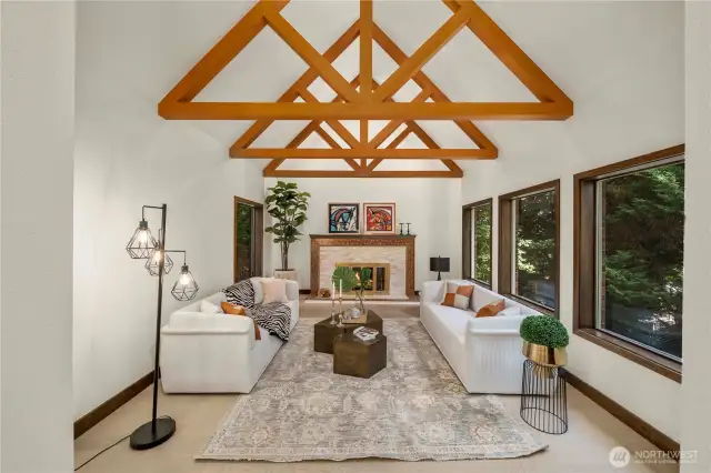 The living room showcases fine wood framing and rich architectural detail