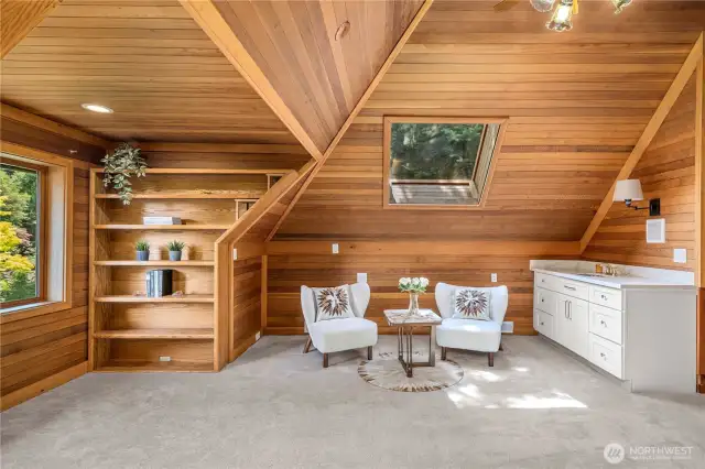 Bonus space off the master with fireplace and sink—ideal for a lounge, office, or nursery.