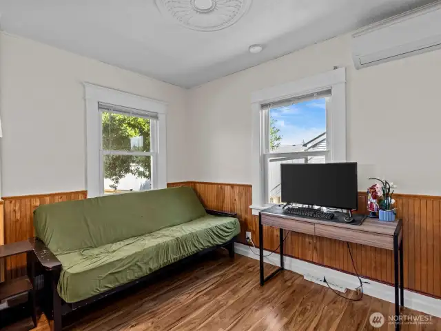 The back bedroom, adjacent to the bathroom.