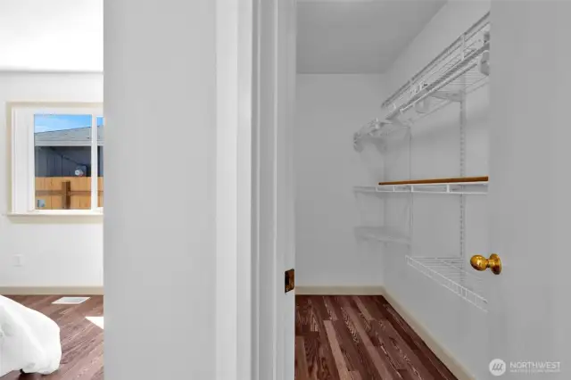 Primary bedroom with walk in closet