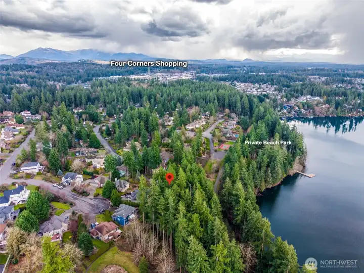Bird’s-eye view of Lake Wilderness and surrounding Maple Valley neighborhoods, emphasizing the lifestyle and recreation this location offers.