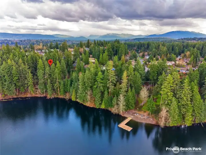 Scenic aerial of Lake Wilderness shoreline and private community waterfront access available to residents of Lake Forest Estates.