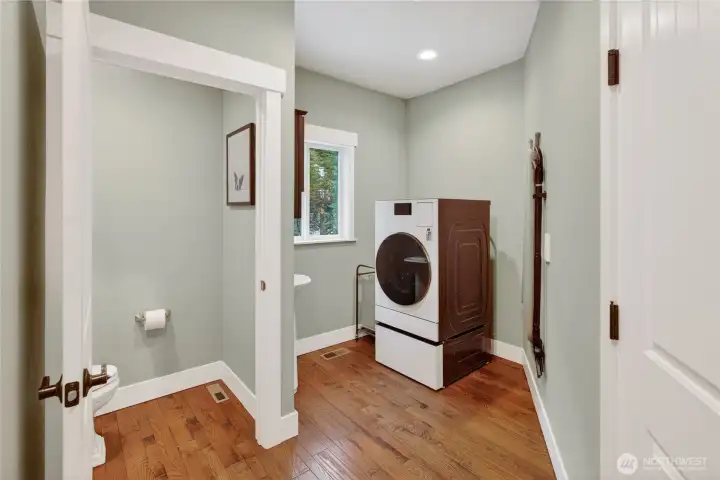 Laundry with half bath.