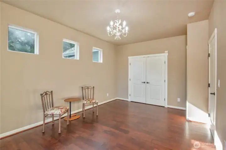 Downstairs bedroom with walk in closet and attached 3/4 bath