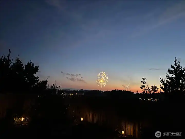 In the front yard watching the sunset and fireworks at the same time. How amazing is that!