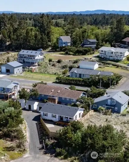 Aerial view showing east of the house and mountains just a few miles away along with the Willapa Bay.