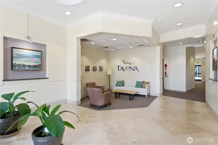 Bright, inviting lobby at Tavona, leading directly to the courtyard and elevator access