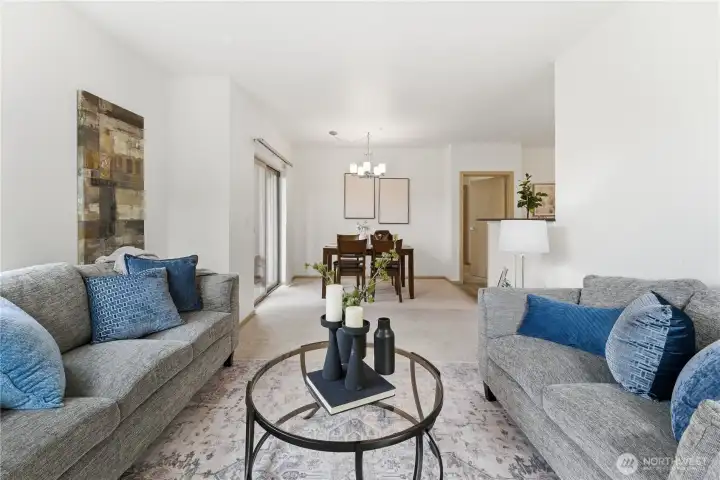 Spacious open-concept layout between living and dining areas