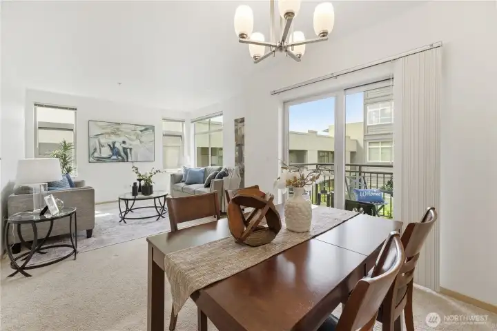 Light-filled dining area with open flow to the living room