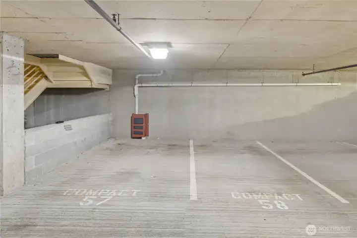 Secure common-garage parking with TWO reserved, covered stalls