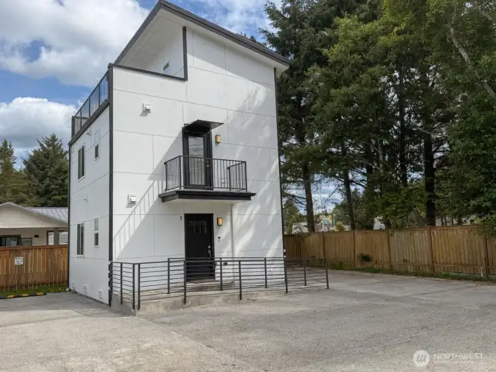 Modern home with thoughtful layout and convenience.  Included two dedicated parking spaces.  Ocean access just half mile away. Zoned for nightly rentals!