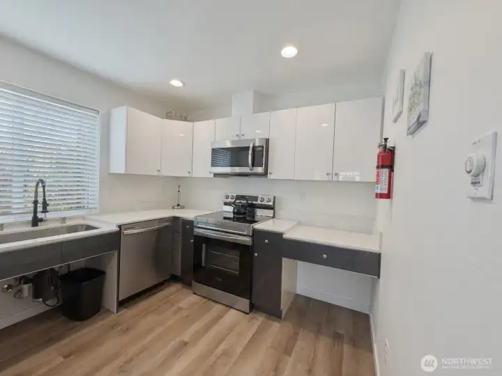 Beautiful kitchen with plenty storage & access to