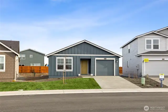 Madison Elevation C - picture of another home - colors and materials vary