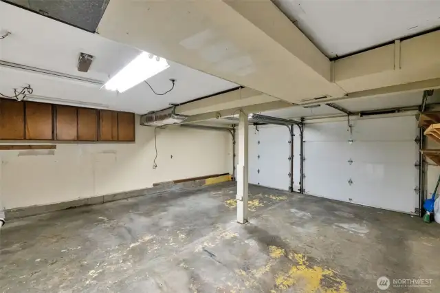 1 two car garage attached, 1 drive-thru one car garage attached, 1 one car garage in back yard