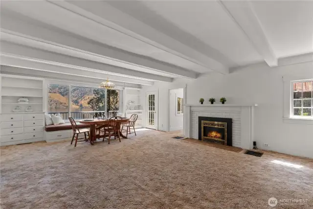 Putting the GREAT in great room (way before it was a "thing"), this living/dining room is expansive!