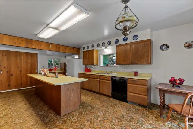 This kitchen is HUGE! Plenty of seating at the island and great for entertaining.