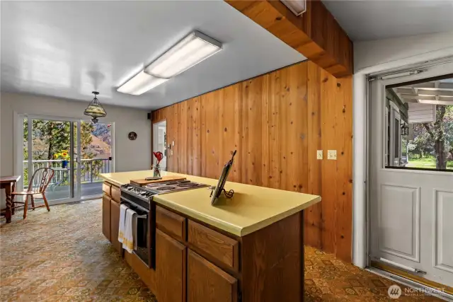So convenient! Bring in groceries directly to the kitchen via the covered front porch door,  and deliver meals via the slider for easy outdoor dining with a Lake Chelan view!