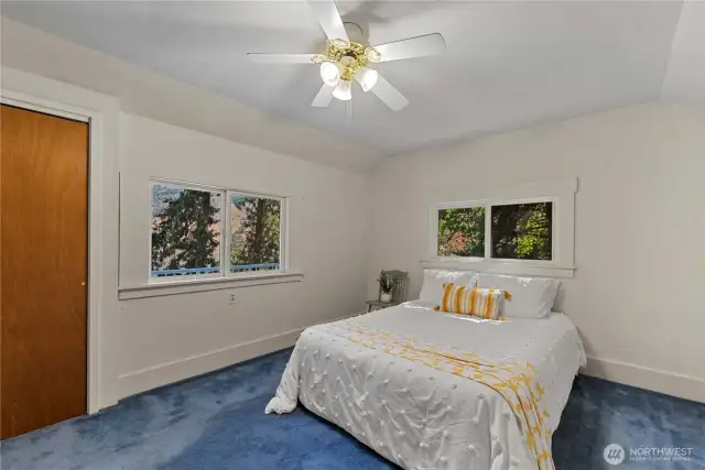 The larger main floor bedroom could easily accommodate a king bed. The bed in this photo is a queen.