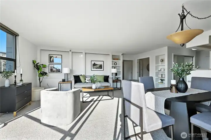 Gracious open living & dining area with custom built-in's & redesigned with awesome den space.