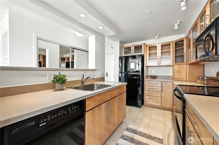 This view of the kitchen is taken from the dining area.