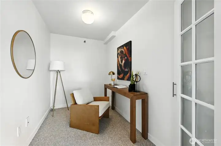 Check out this redesigned storage area to a new den space with glass French doors!