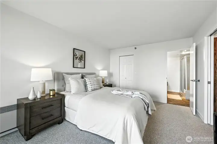Another angle of the gracious primary suite with a stunning double vanity bath & shower & huge walk-in closet.