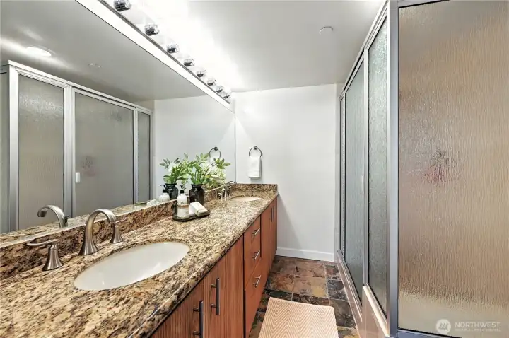 Stunning primary double vanity shower off the king size primary suite.