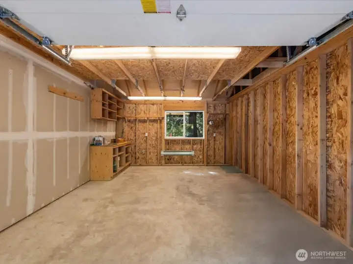 A 220 outlet in the garage and a generator hook-up ensure you stay connected and comfortable, even in the quiet seclusion of the forest.