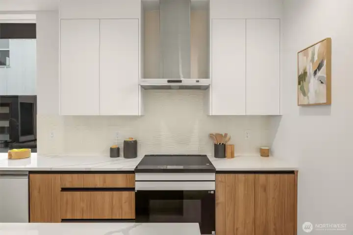 Sleek Samsung Bespoke appliances bring function and flair to this beautifully curated space.