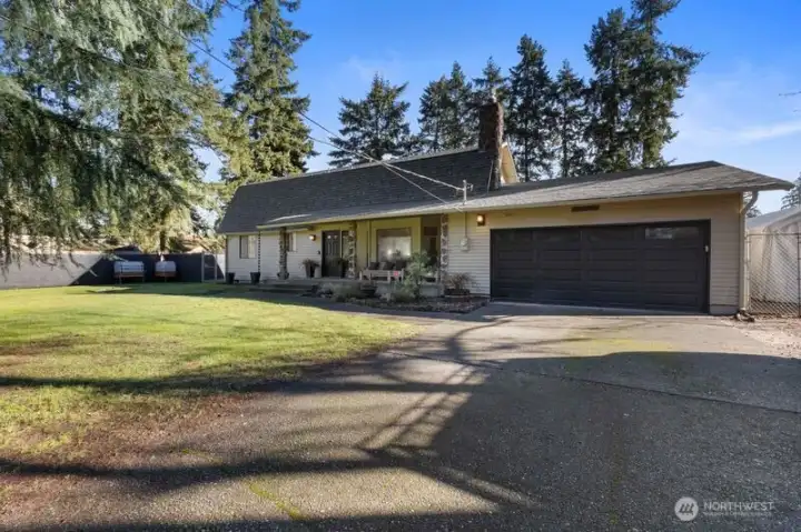 Peaceful, Park-Like Setting – Set on a shy half-acre with mature landscaping and trees, including a serene pine grove in the front yard. The backyard offers a quiet, private setting with plenty of room for gardening, relaxing, and enjoying the natural surroundings.