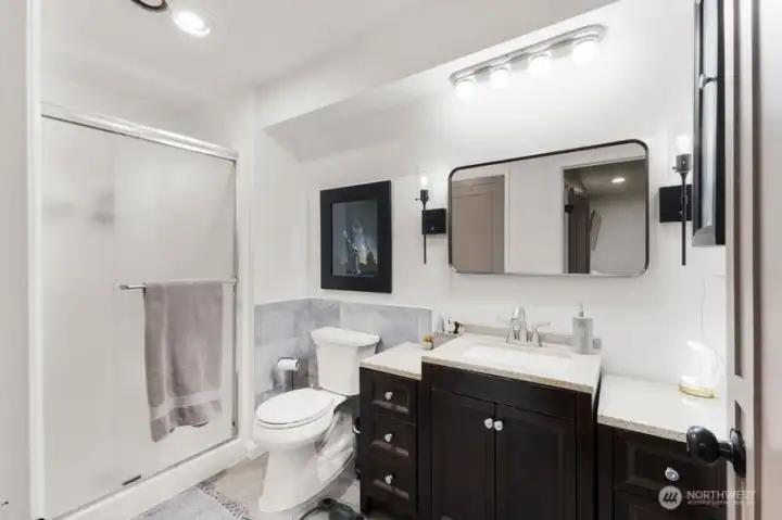 Comfortable and updated Primary Bath – Enjoy a spacious step-in shower, tasteful tile work, and generous counter and cabinet storage.